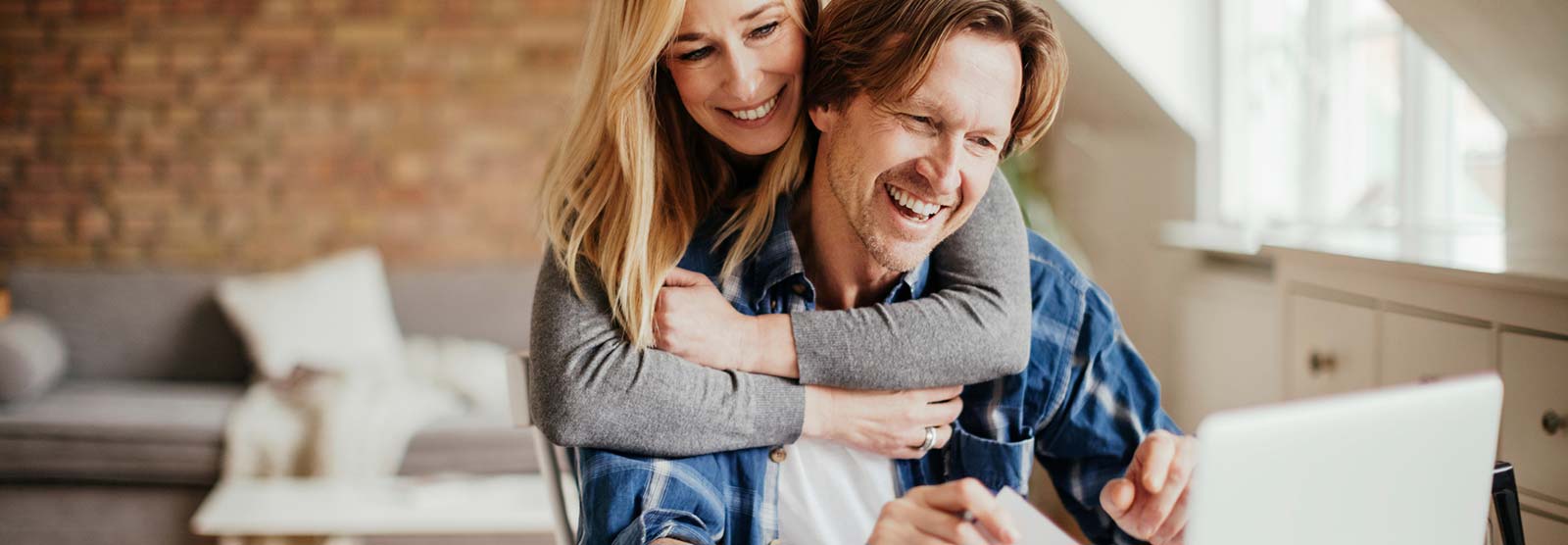 Couple using a laptop computer