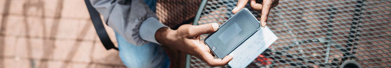 Man making a mobile deposit with a smartphone